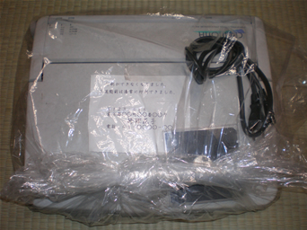 ビニールに包んだワープロ